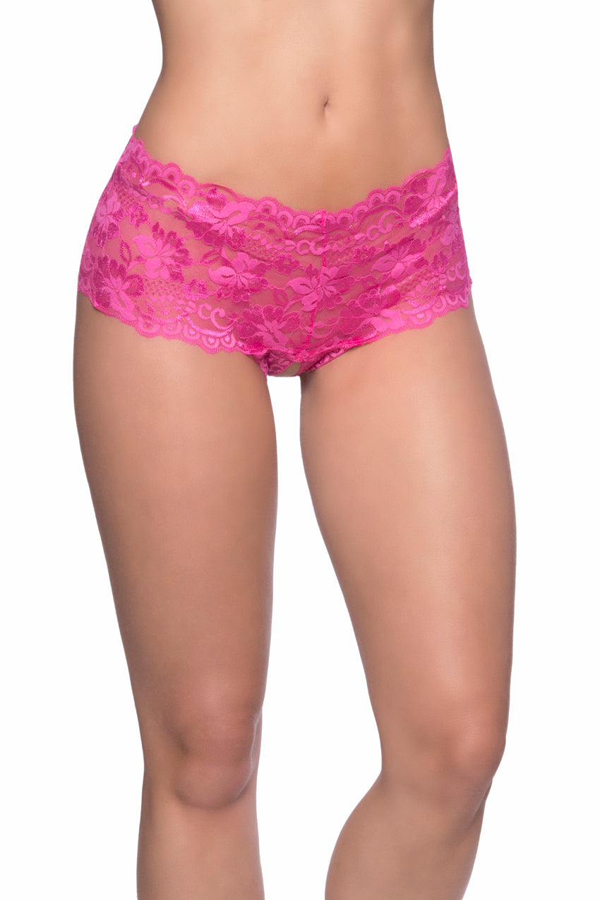 Model wearing Pink Good Night Kiss Lace Crotchless Boyshort in soft lace with scalloped edges and lace-up back detail.