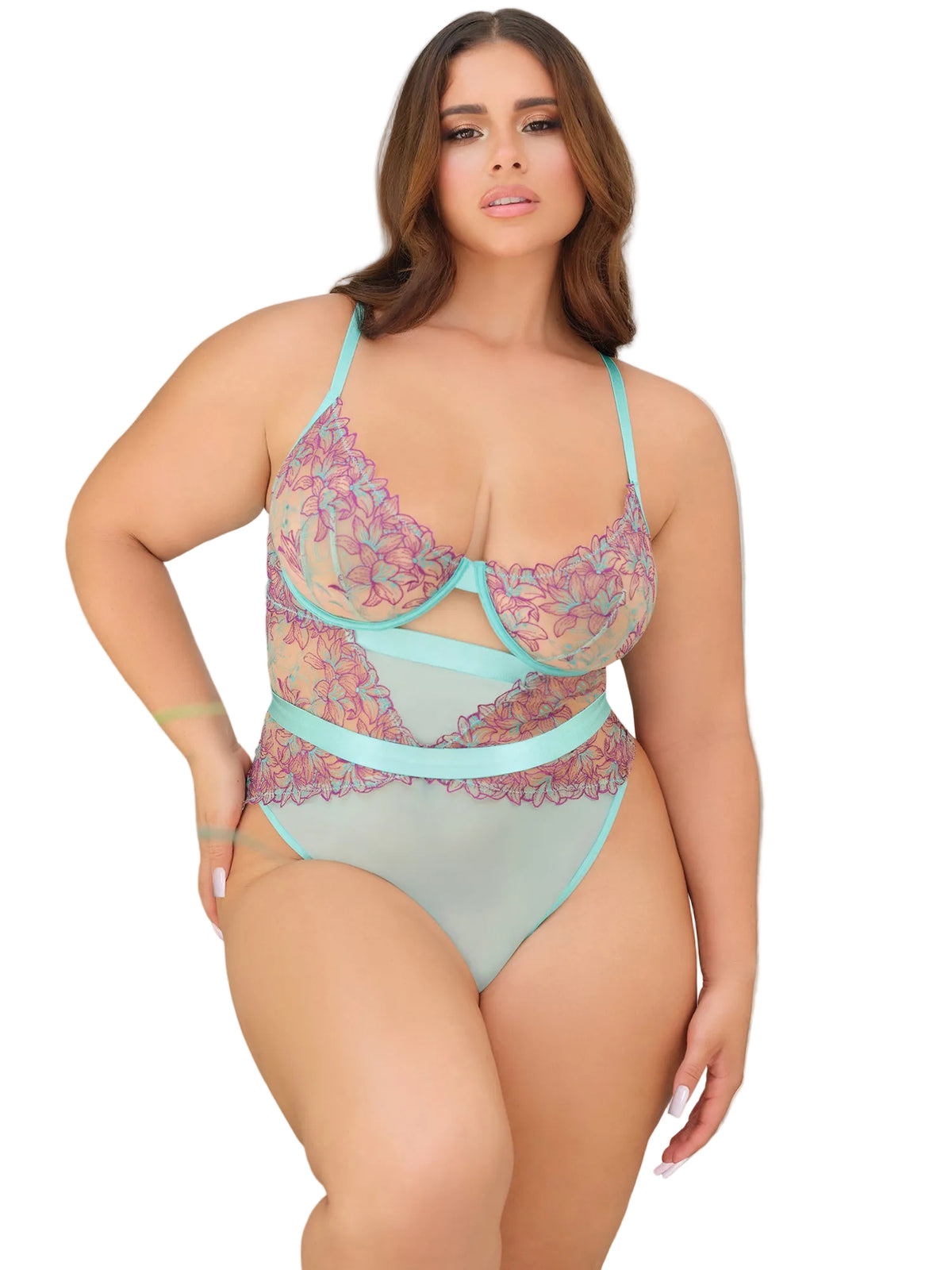 Woman wearing a floral lingerie set with a blurred background