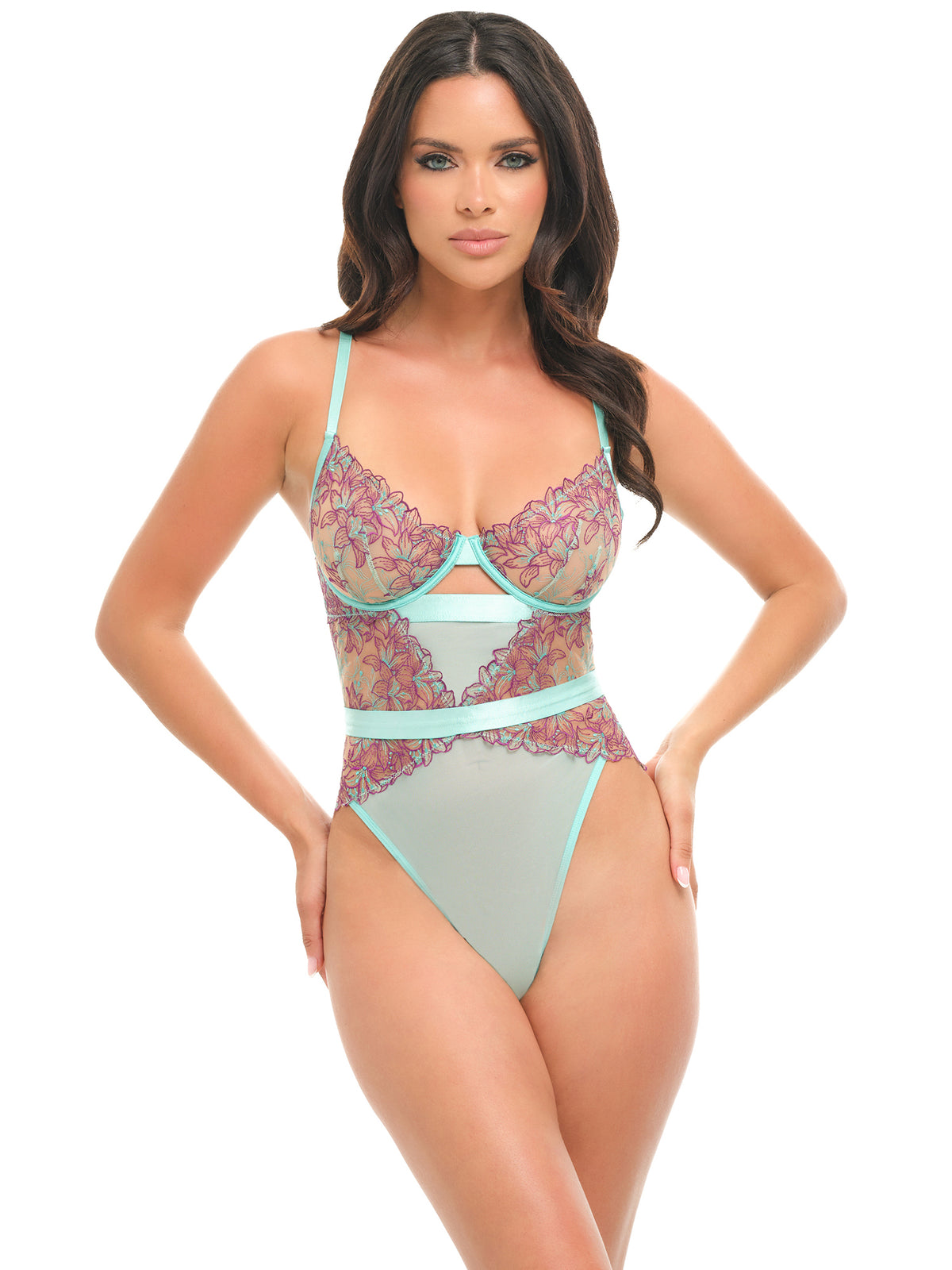 Woman wearing a floral lingerie set on a white background
