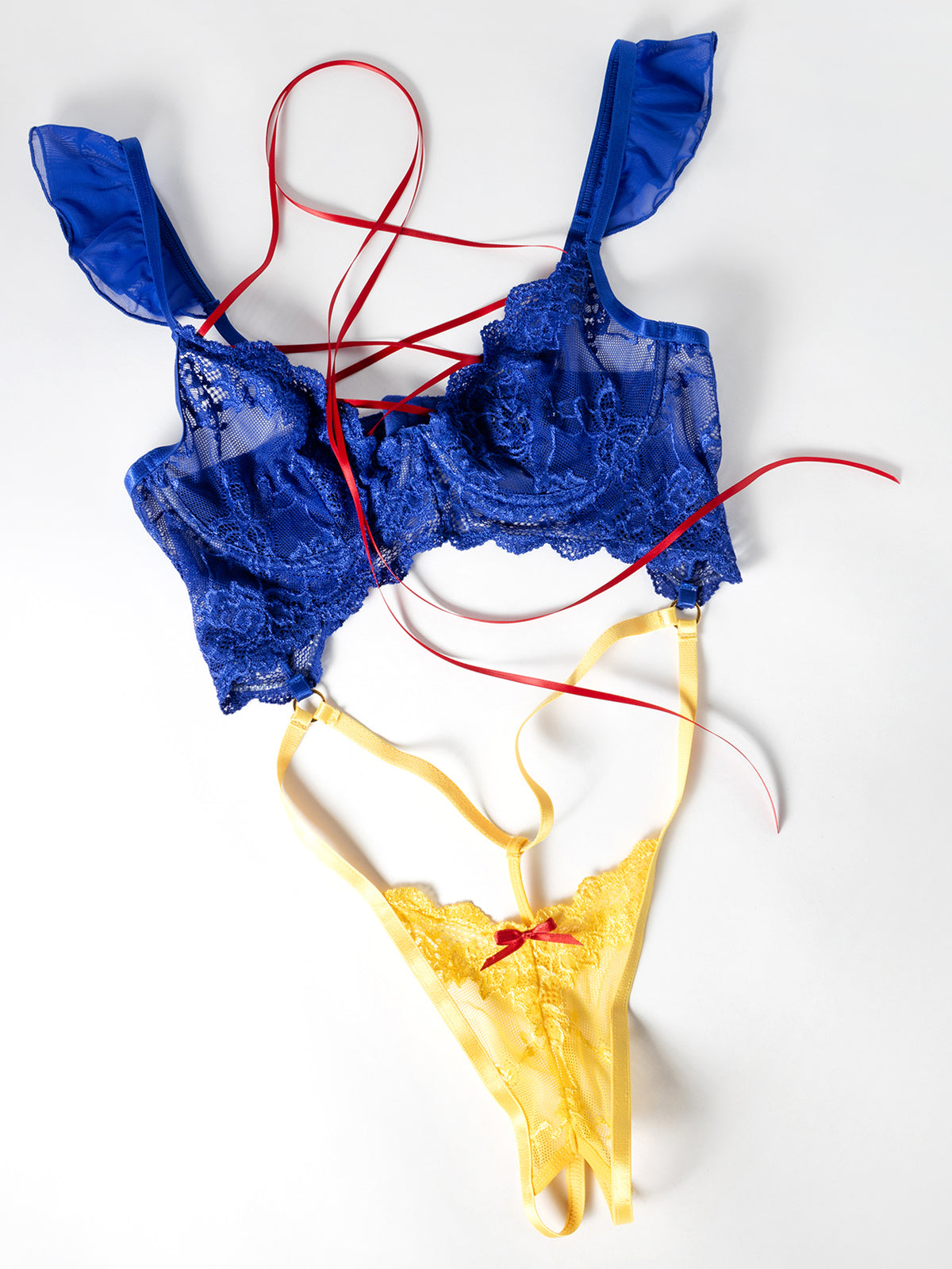 flat lay of a Blue lace yellow bottom teddy with ribbon neck tie on a white background