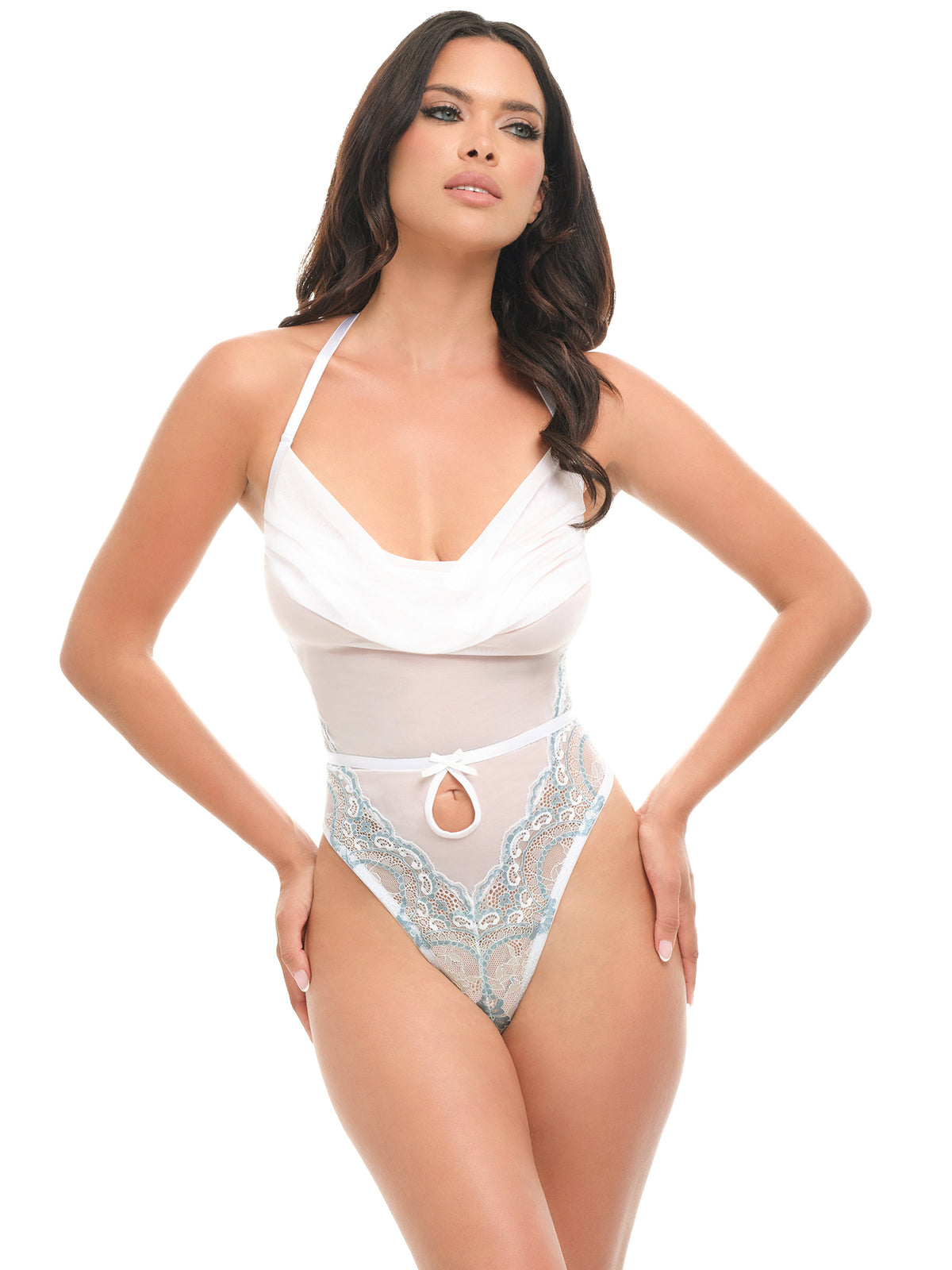 Woman wearing a Victoria sheer halter teddy in white and milky blue with cowl neckline, lace mesh, and G-string back
