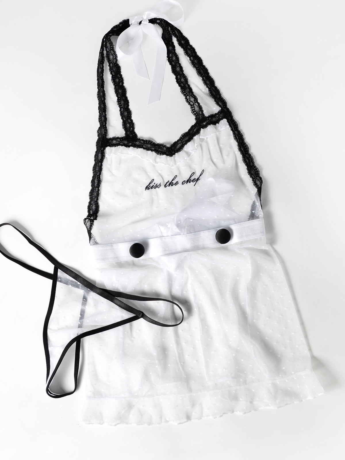 White apron with black accents and ' kiss the chef' text on a white background