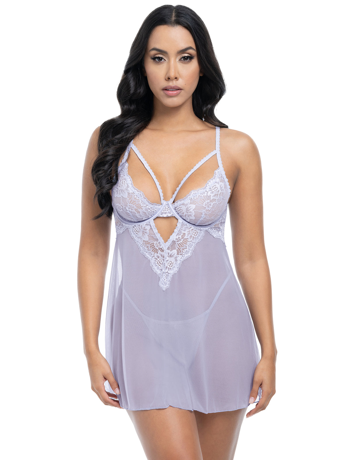 Woman wearing a light purple lace nightgown on a white background