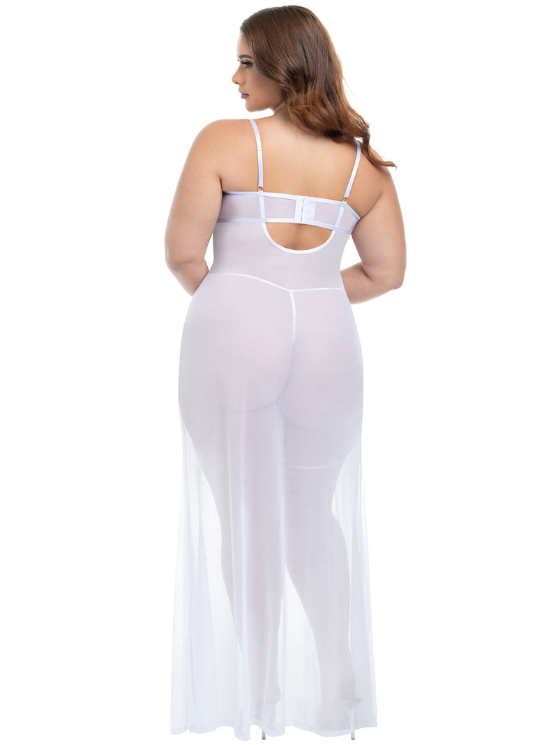Back view of a woman wearing a plus-size sheer dot mesh bridal gown with lace inserts and matching lace garter