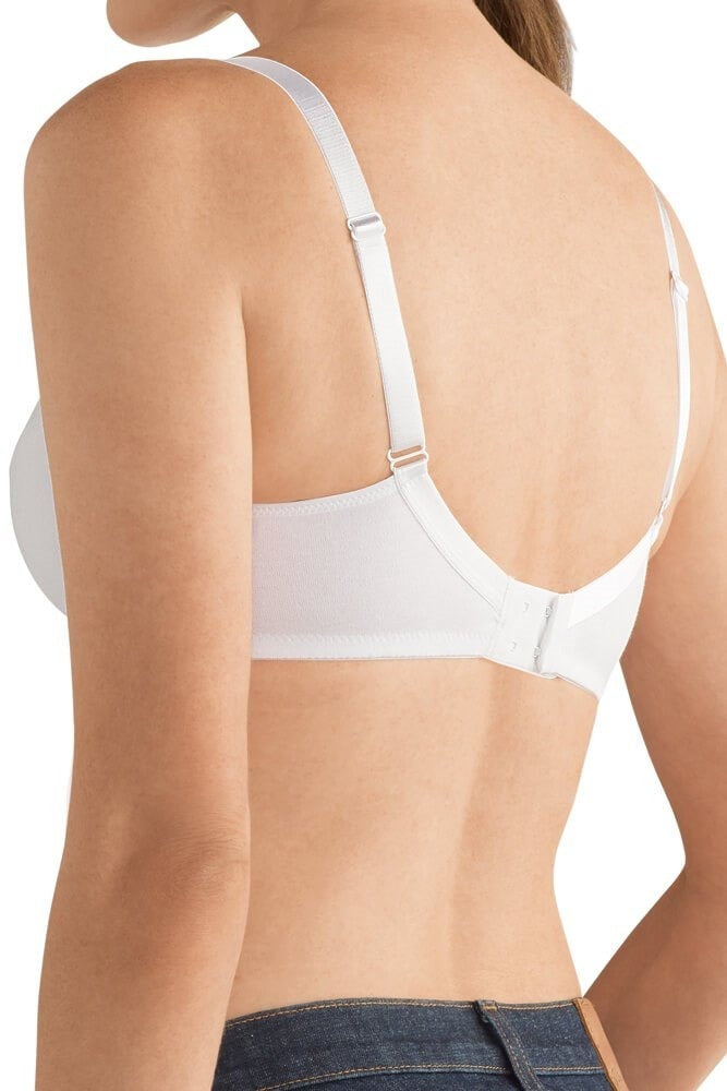 White bra worn by a person on a white background.