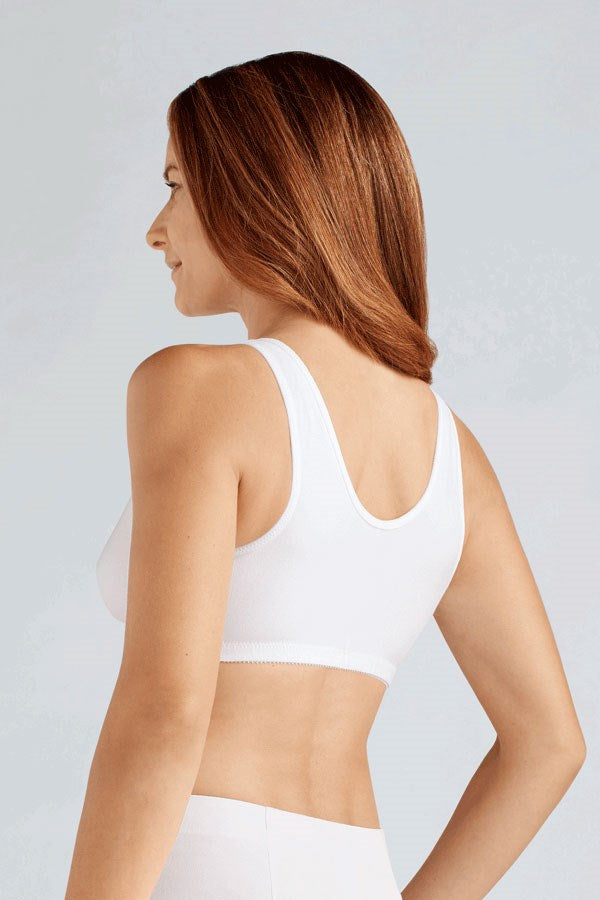 Back view of a Woman wearing a white wire-free front closure cotton bra, ideal for post-surgical comfort and everyday leisure wear.