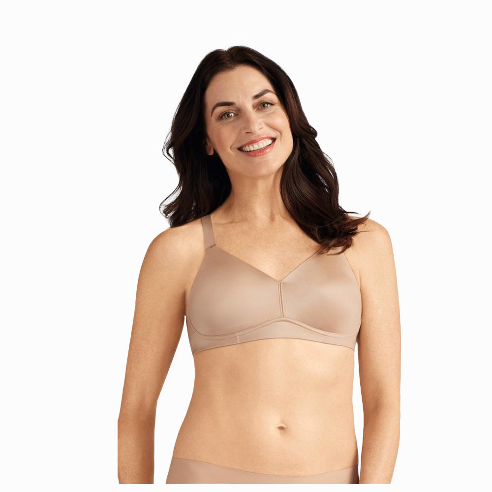 Woman wearing the Amoena Magdalena wire-free mastectomy bra with high back, smooth sides, and wide adjustable straps