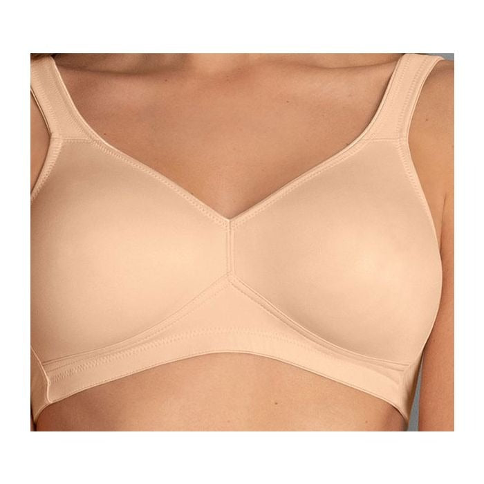 Beige bra on a white background