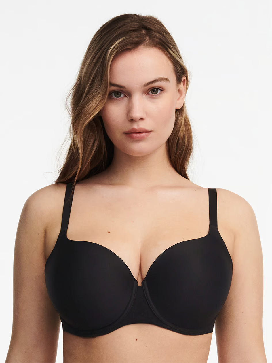 woman wearing a black Chantelle Norah Comfort Smooth Sweetheart T-Shirt Bra with contour cups and lace details