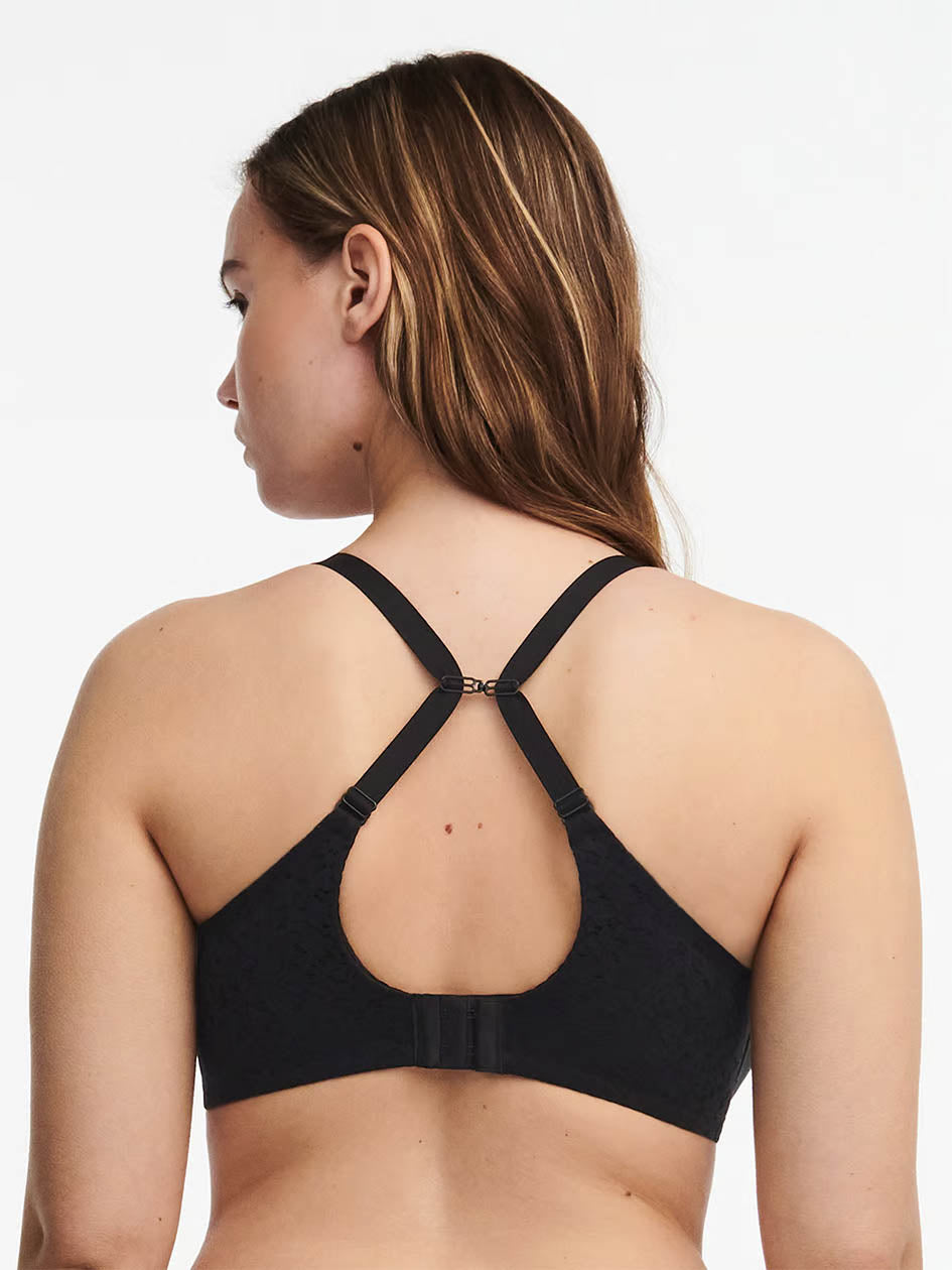 woman wearing a black Chantelle Norah Comfort Smooth Sweetheart T-Shirt Bra with contour cups and lace details