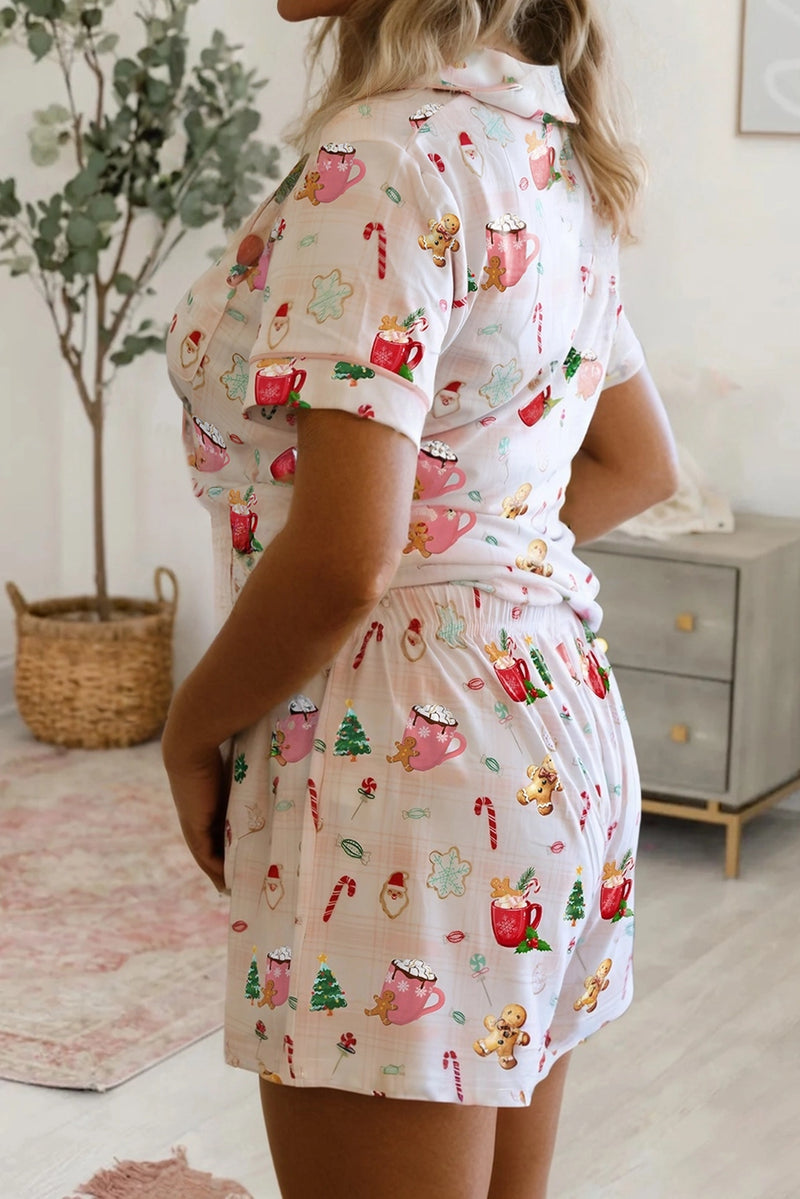 Woman wearing Christmas holiday print short pajama set with relaxed top and matching shorts