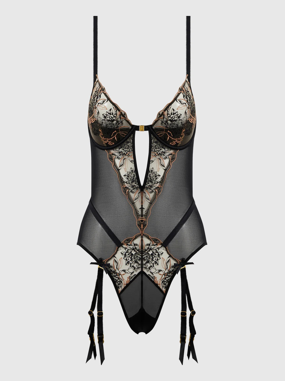 Lace lingerie set with sheer panels on a light gray background