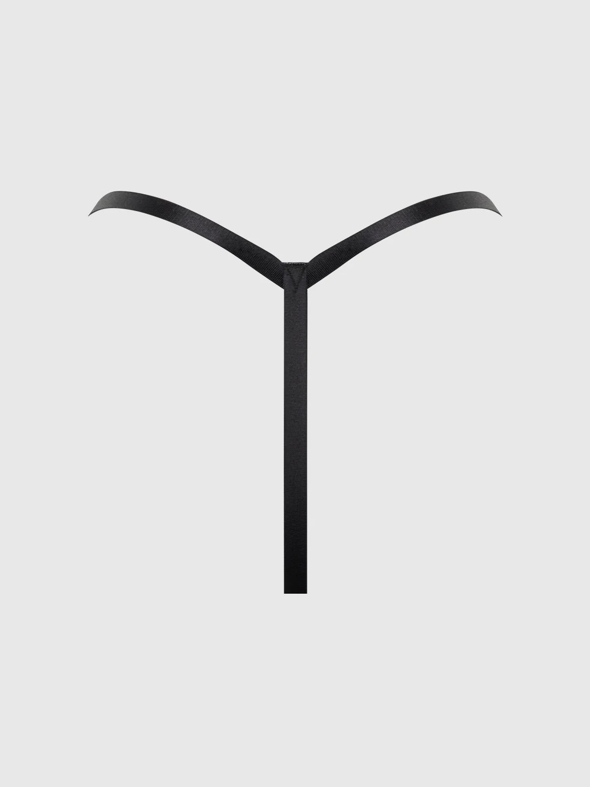 Black Y-shaped object on a light gray background