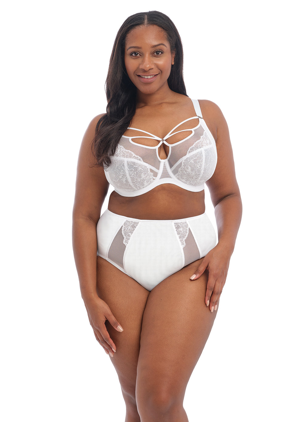 Woman wearing a white Elomi Brianna plunge bra with floral lace overlay and strappy neckline detail.