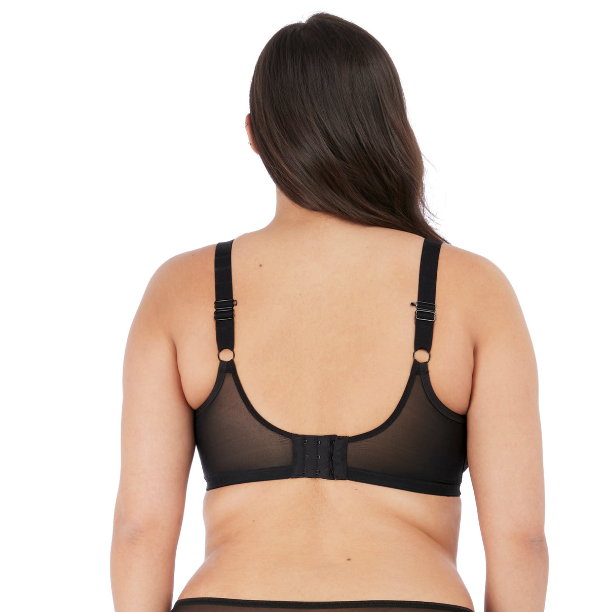 Black bra worn by a person on a white background