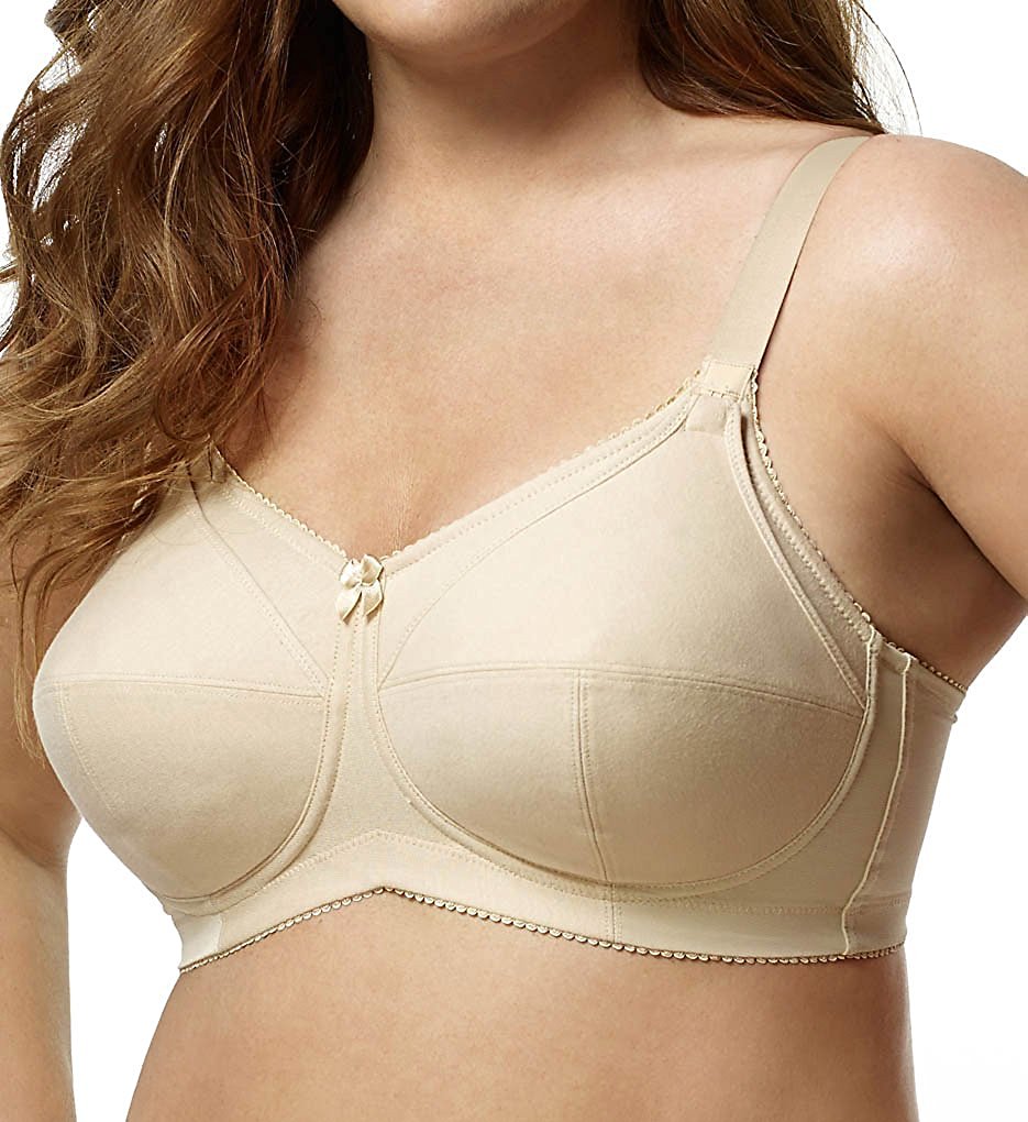 Woman wearing a beige elila nursing bra on a white background
