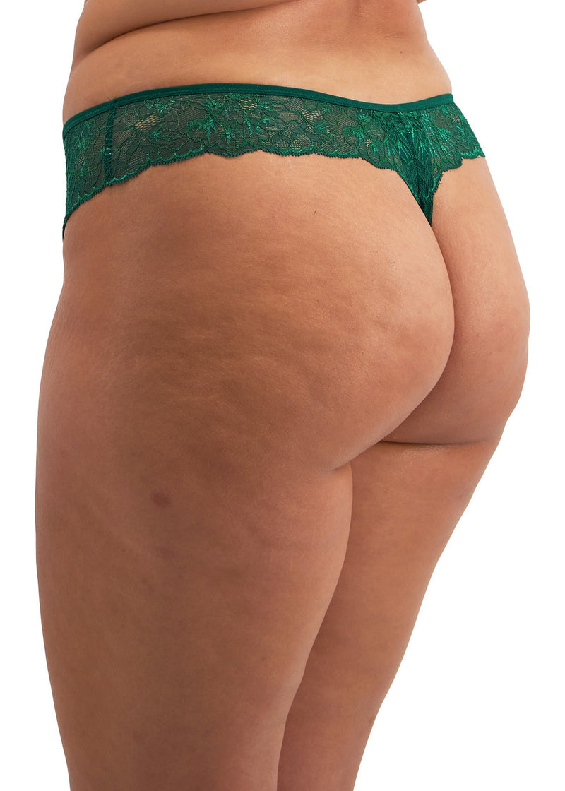 back view of a woman wearing a green thong on a white background