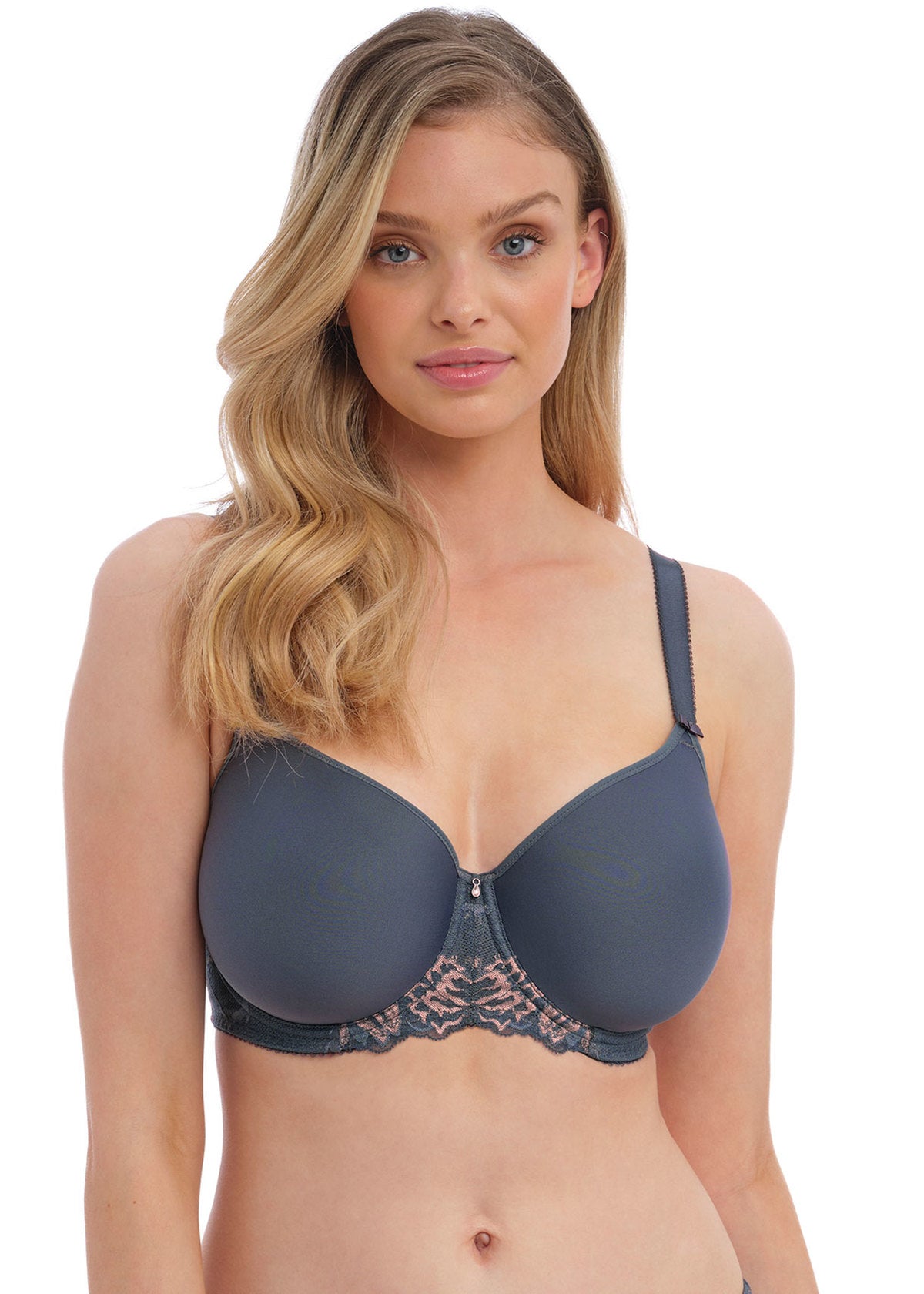 Woman wearing a grey bra on a white background