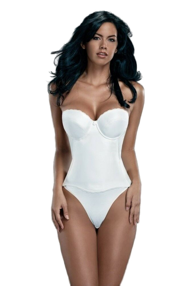 Woman wearing a white bodysuit against a dark background