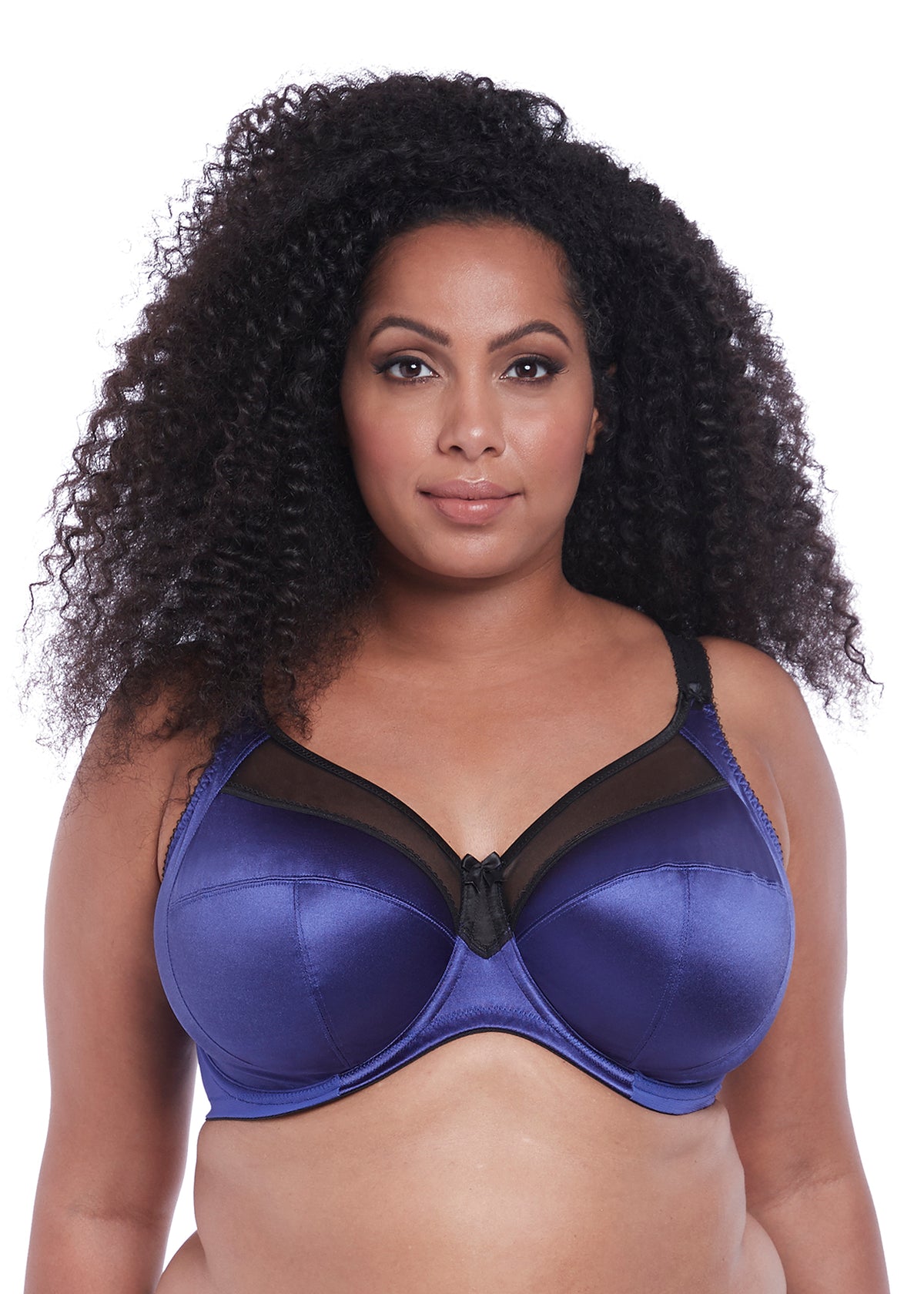 Woman wearing a blue ink colored Goddess Keira underwire banded bra in black with sheer top cup and three-section support design.