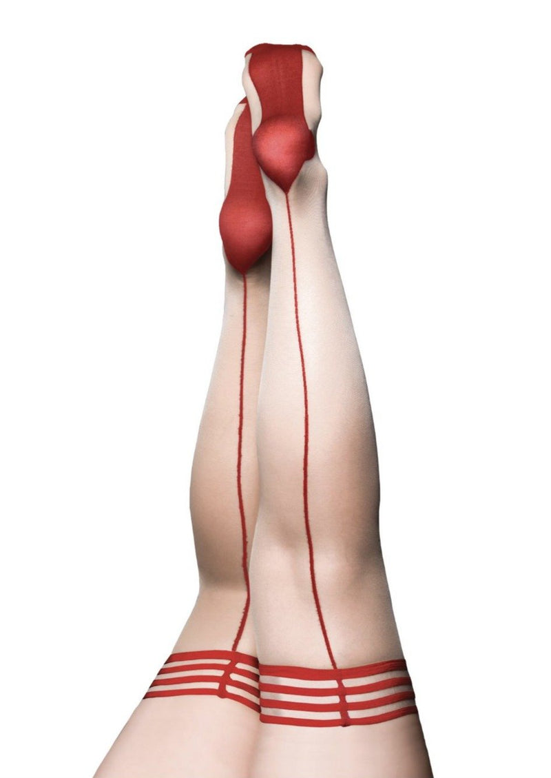 Red and white striped stockings worn by a person on a white background
