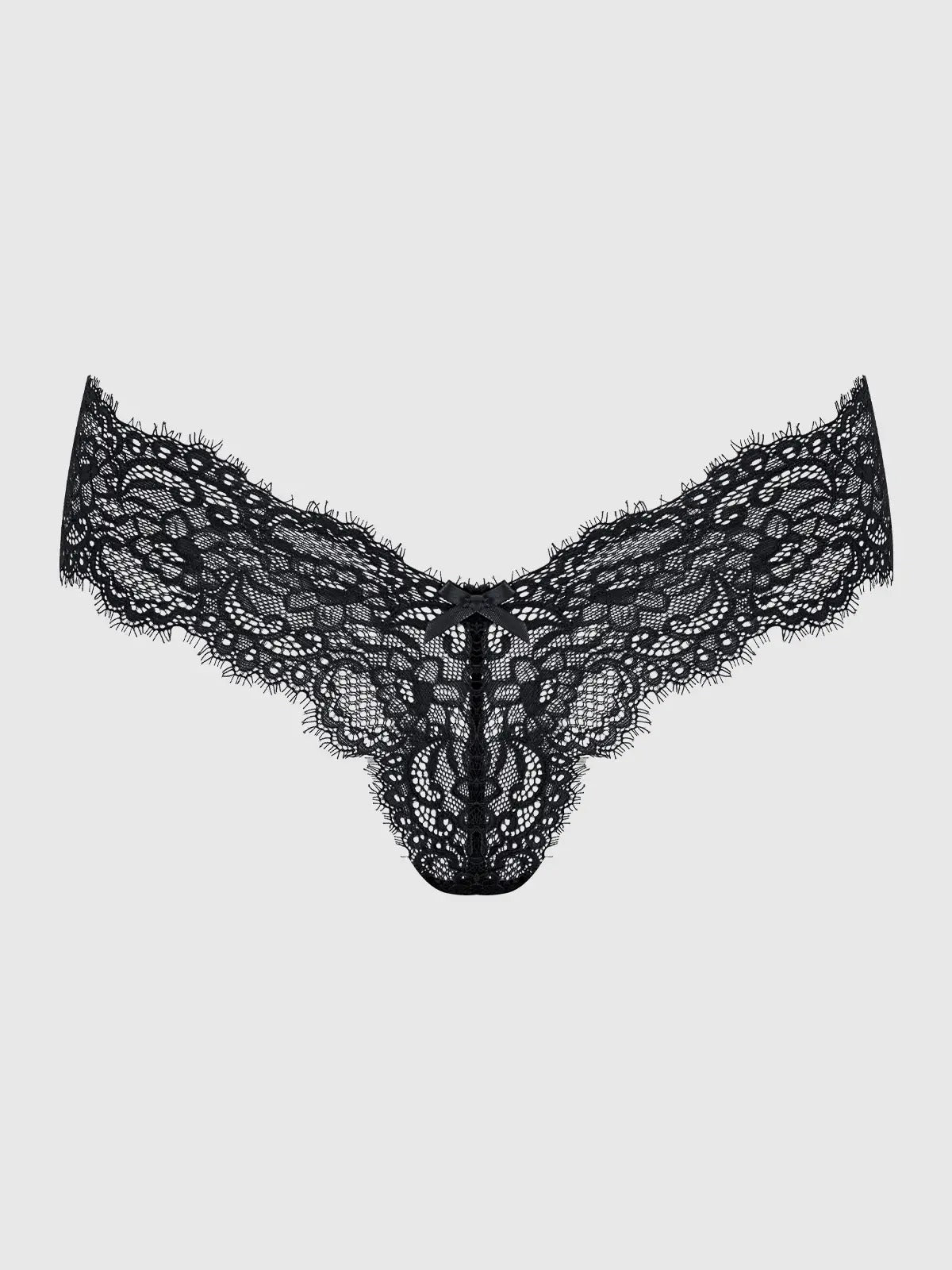 Black lace lingerie on a light gray background