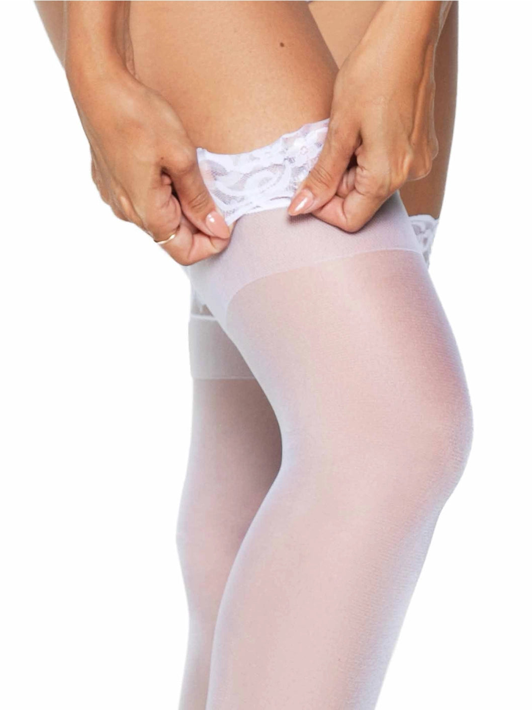 A close-up of a model's legs wearing sheer white thigh-high stockings, with her hands pulling up the white lace waistband.