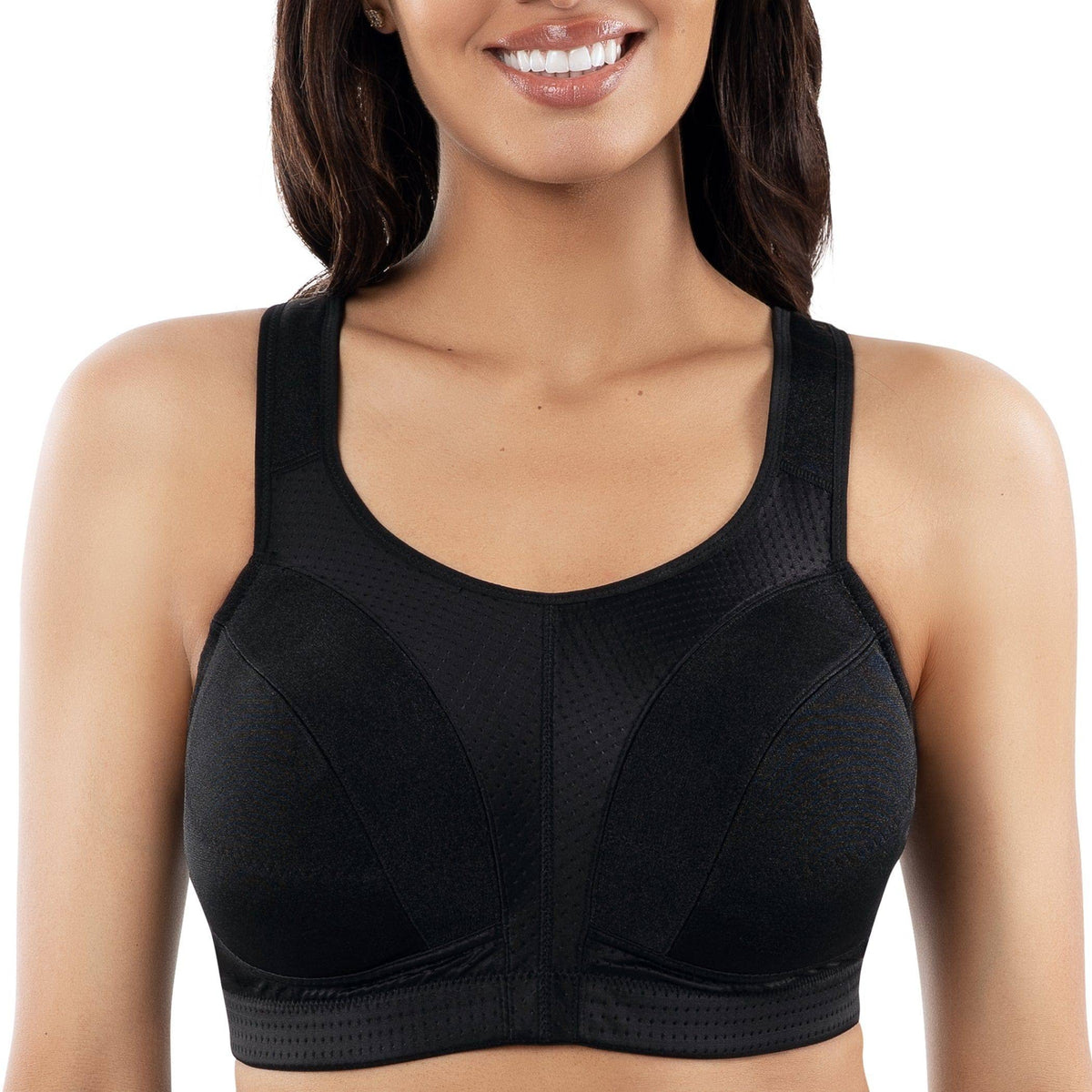 Black sports bra worn by a model on a white background
