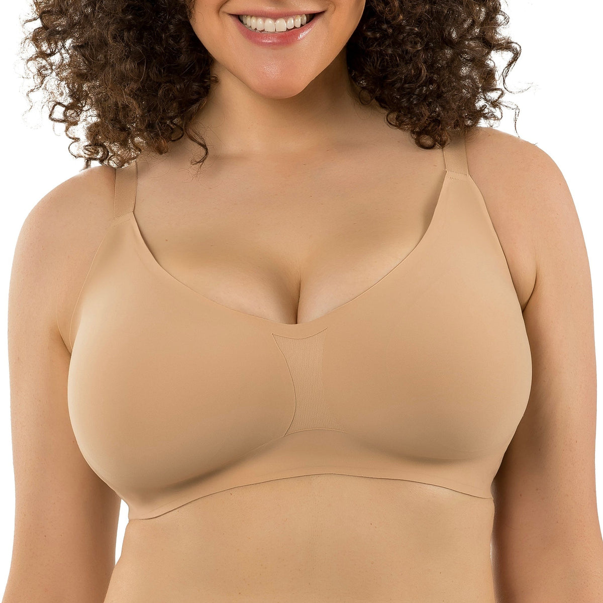 Woman wearing a bleige Parfait Simplicity wire-free bra with bonded support and seamless design on a white background