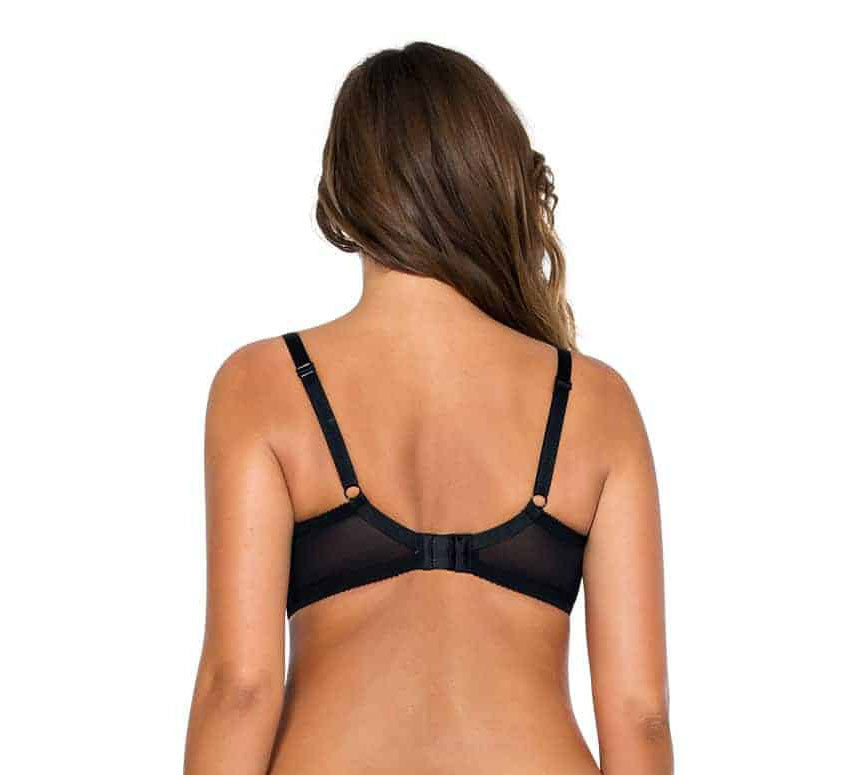 Black bra worn by a person on a white background