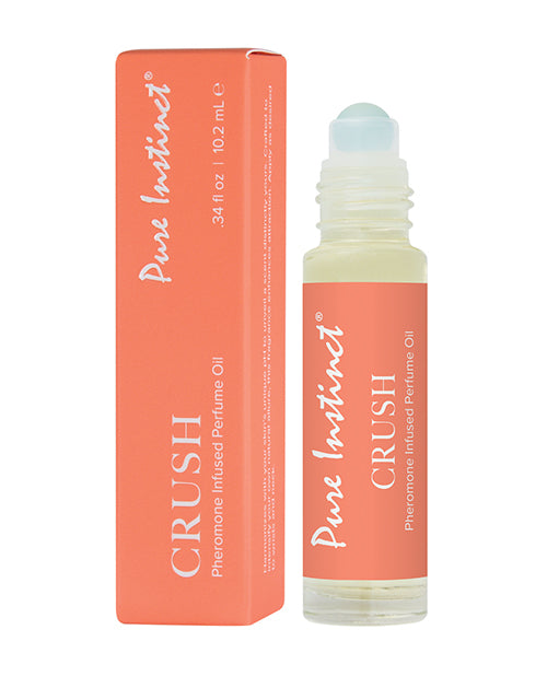 Pure Instinct Crush pheromone-infused perfume oil with packaging on a white background