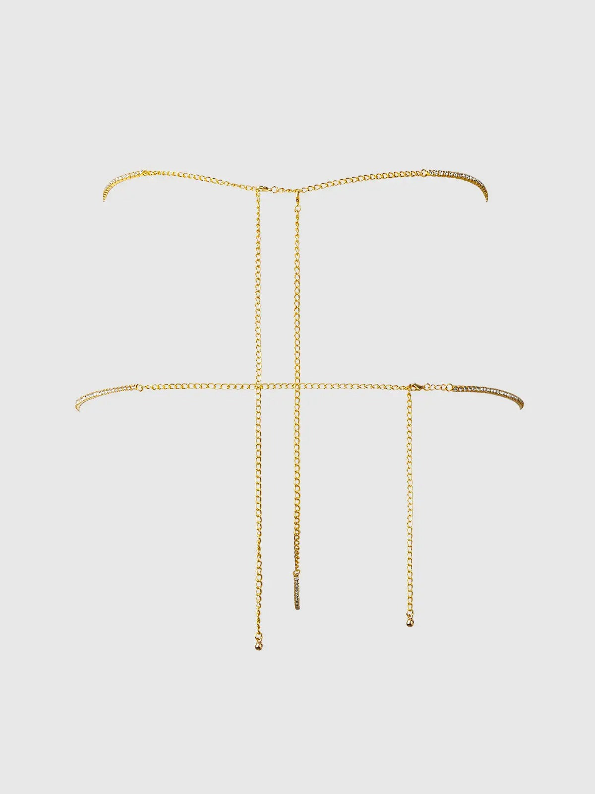 Gold rhinestone panty with intricate design on a light gray background