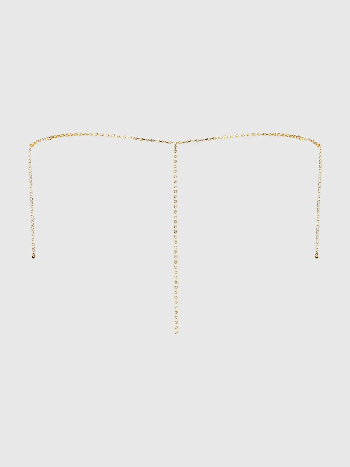 Back view of a gold thong with a neutral background