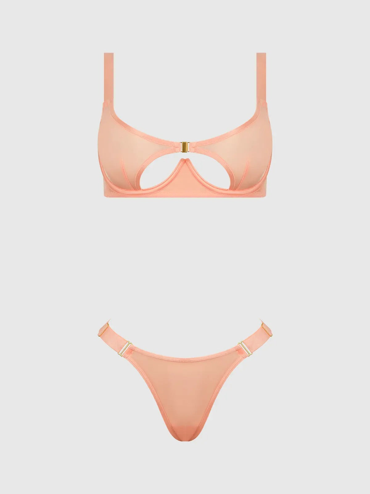 Peach-colored bra set on a light gray background