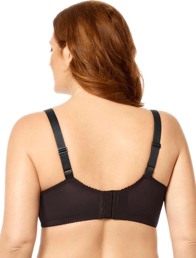 Woman wearing a black bra on a white background