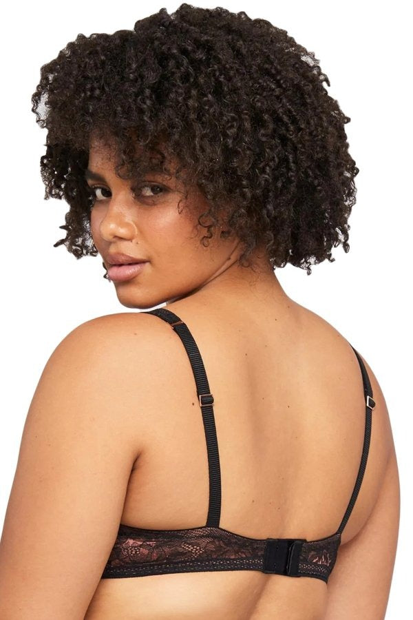 Back view of a woman wearing a Montelle Enchanted Mystique plunge bra with foam cups and stretch lace for a smooth, supportive fit.