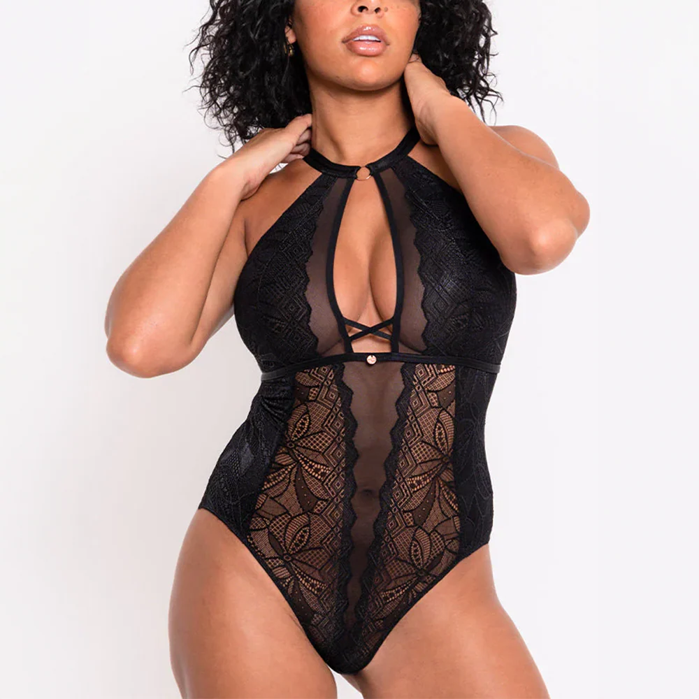 Black lace bodysuit worn by a model on a white background