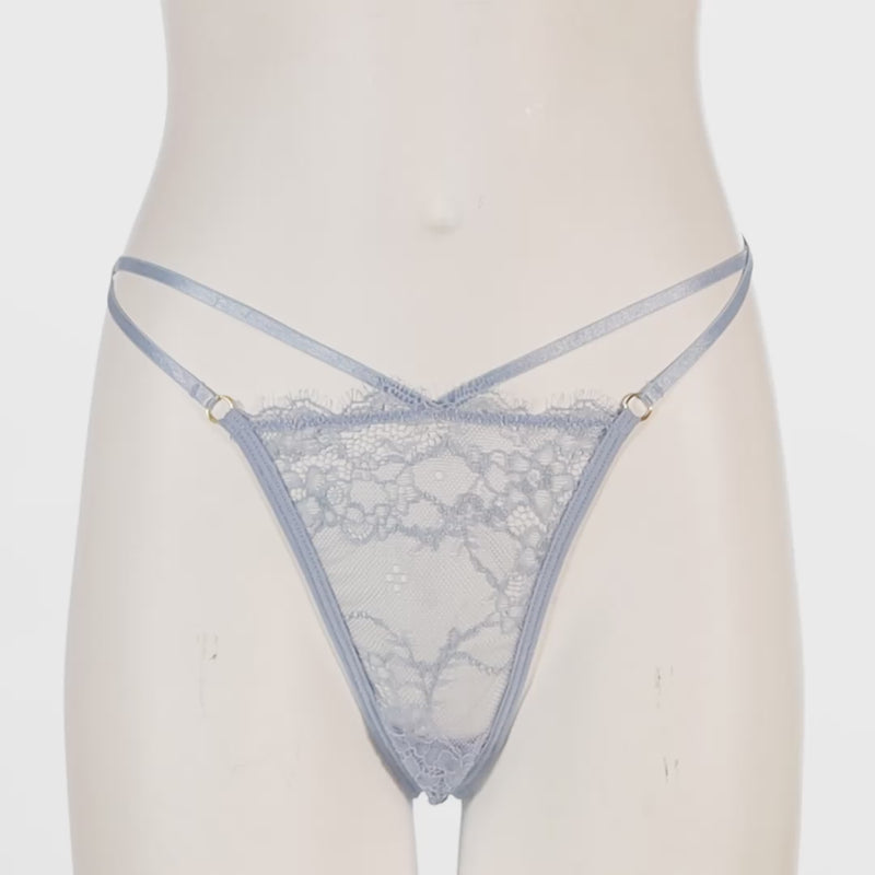Light blue lace thong worn by a mannequin on a white background