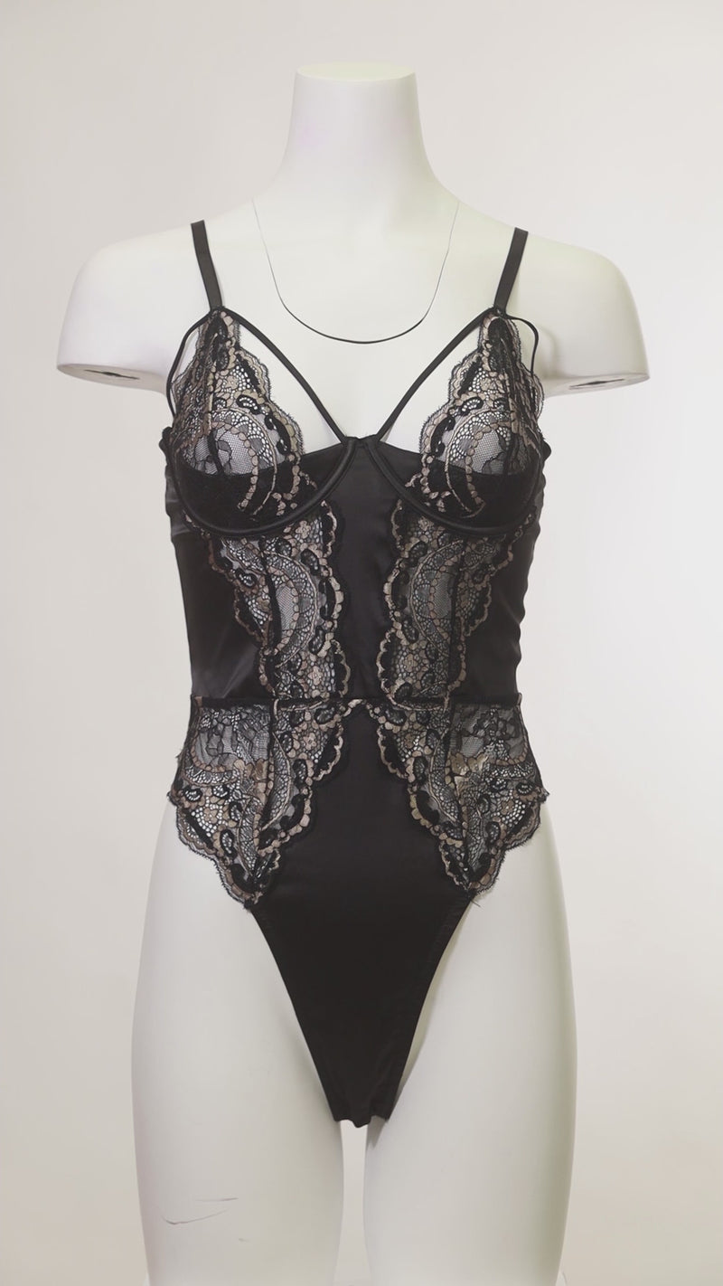 mannequin wearing the Model wearing the Dakota Underwire Lace & Mesh Teddy with embroidered lace and sheer mesh panels.