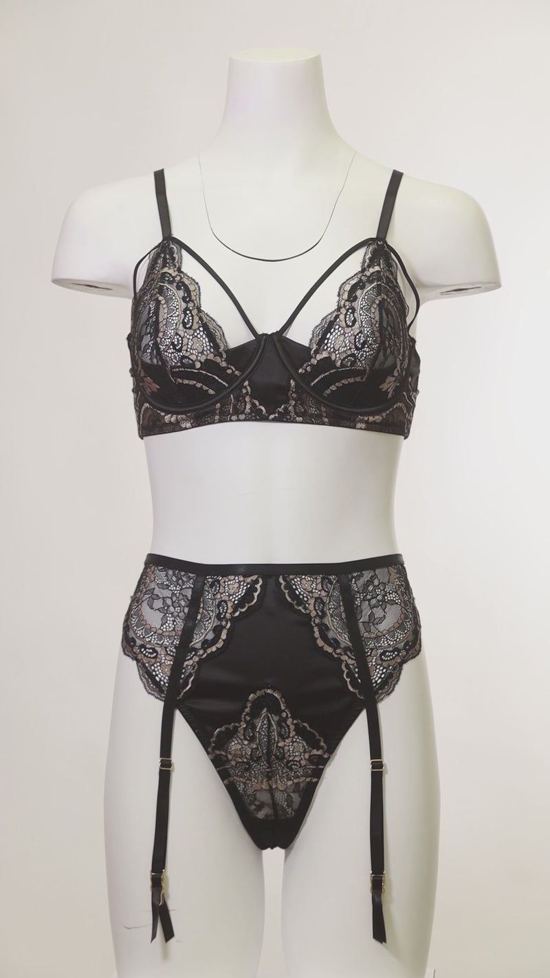 Dakota Cage Bra Set highlighting adjustable garters and G-string design.