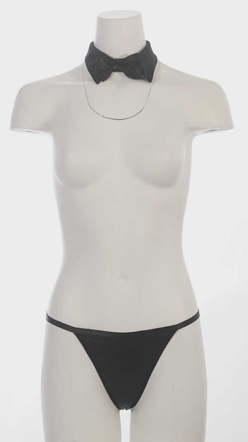 Mannequin with a bow tie collar and thong on a white background