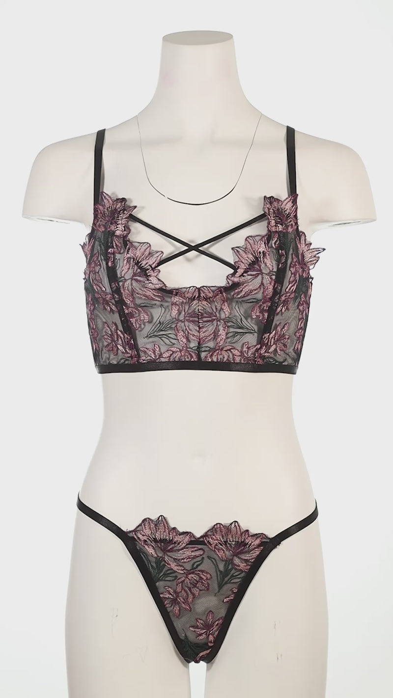 Floral patterned bra set on a white background