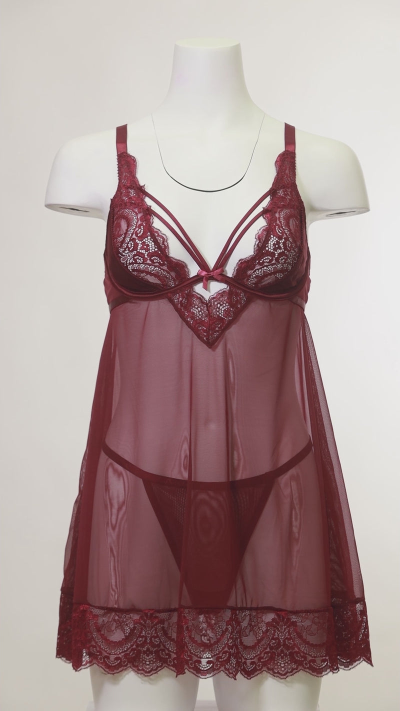 Mannequin wearing a Wynter Cage lace and mesh babydoll with underwire top and matching G-string