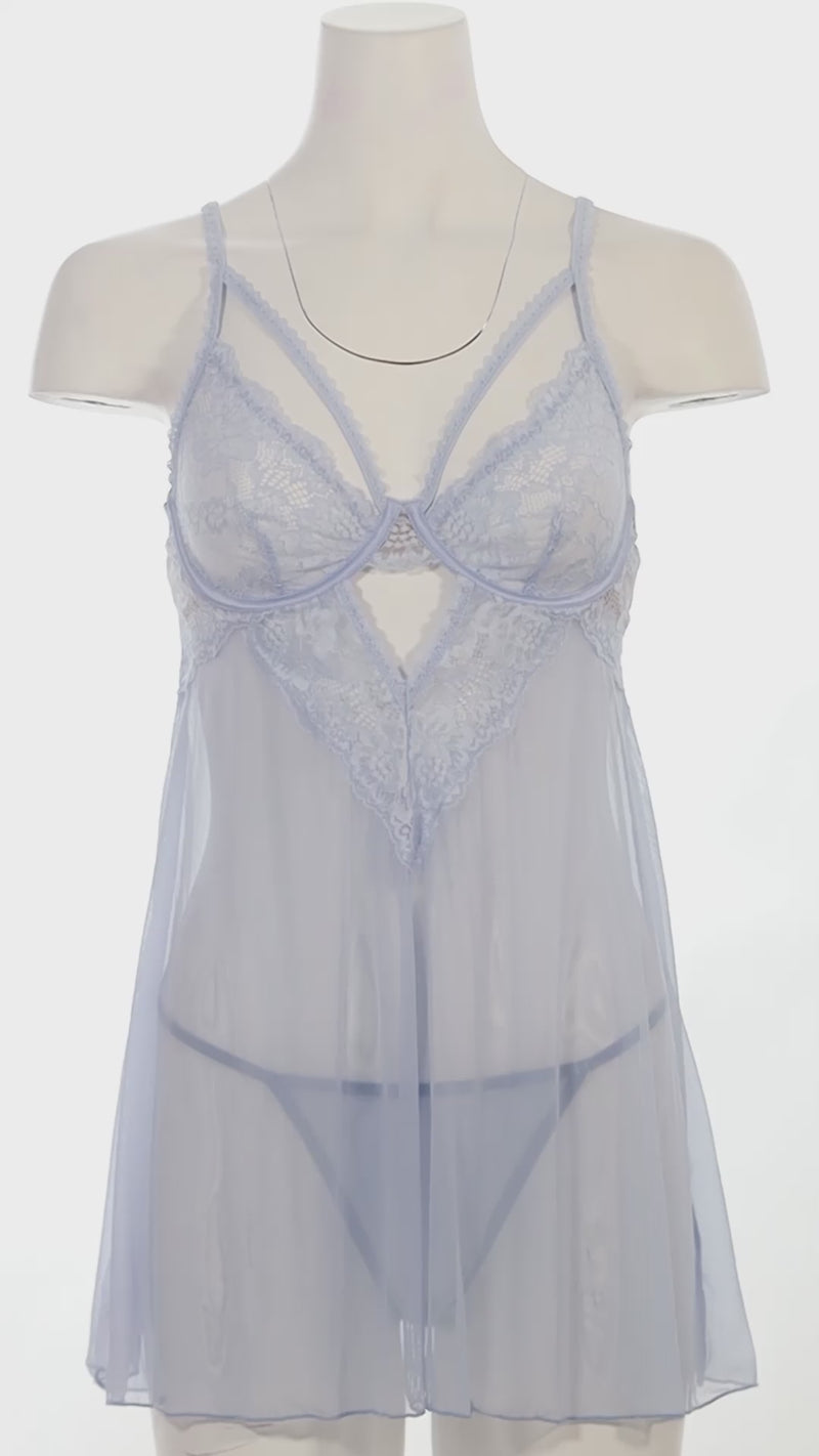 Light blue lace nightgown on a white mannequin on a white background