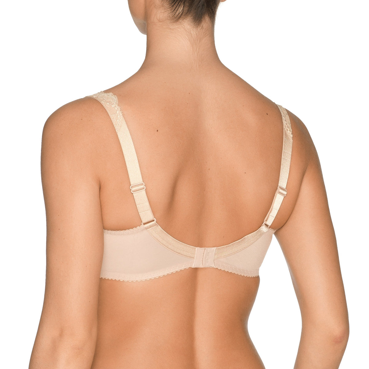 Beige bra on a white background
