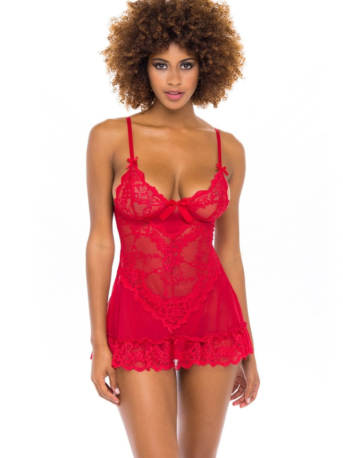 Woman wearing a red lace lingerie set on a white background